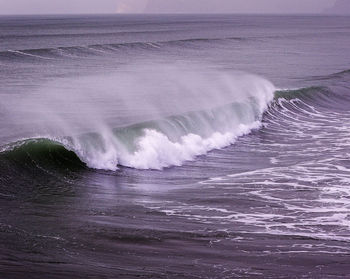 Waves splashing on rocks