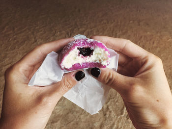 Midsection of person holding ice cream