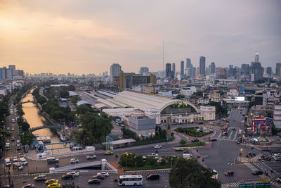 High angle view of cityscape against sky during sunset