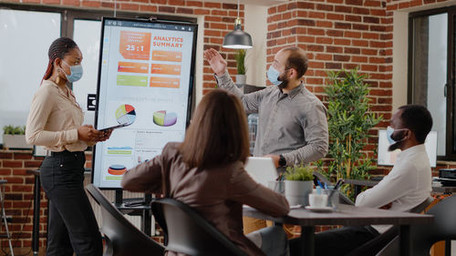 Group of business colleagues working in office