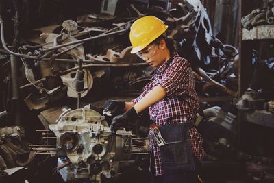 Woman working in machine