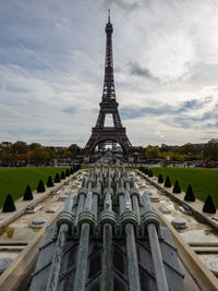 View of tower against cloudy sky