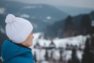 Portrait of boy in snow