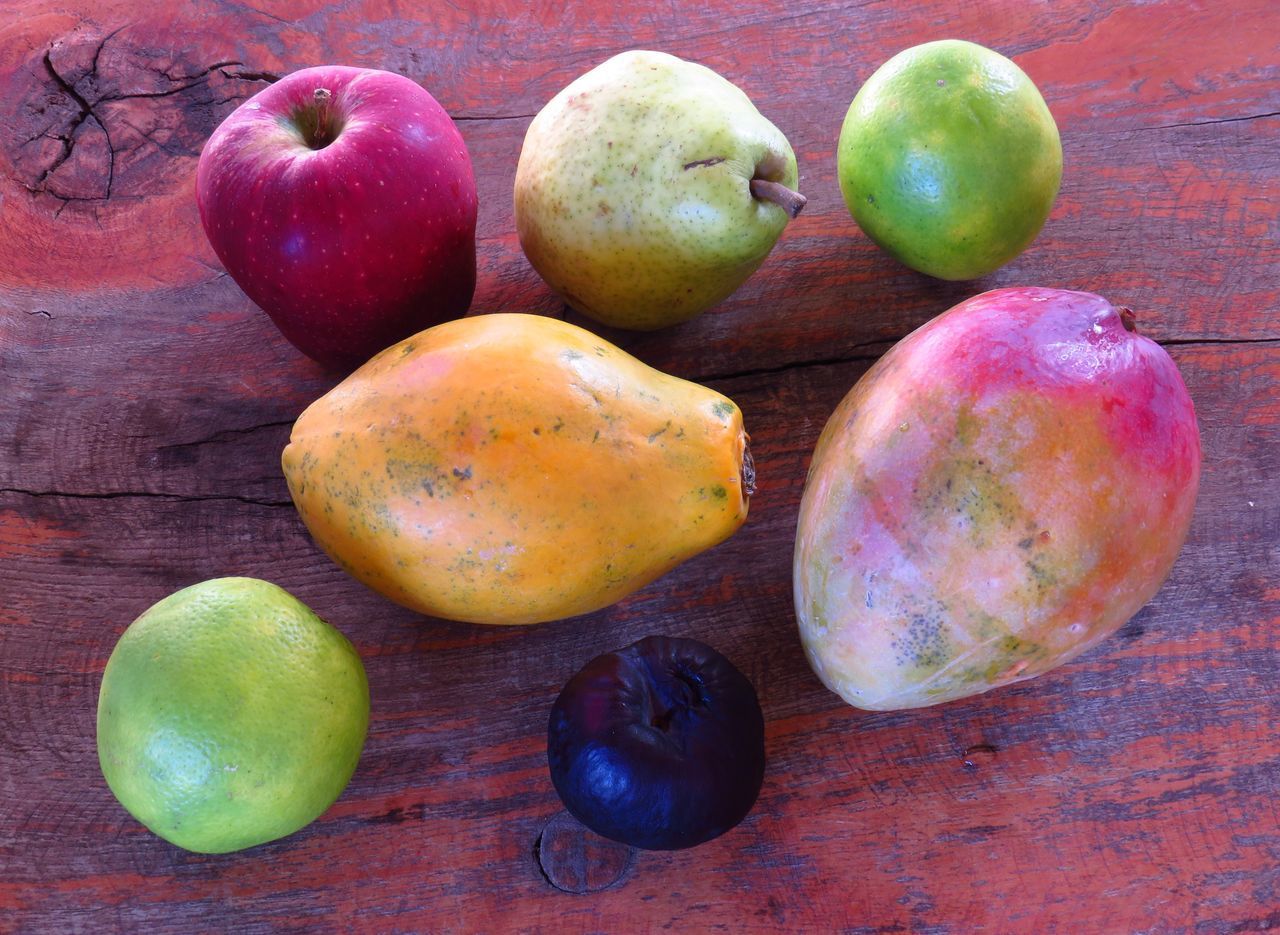 FRUITS IN PLATE ON TABLE