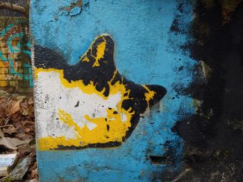 Close-up of graffiti on wall