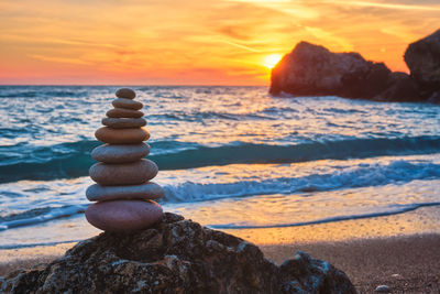 Concept of balance and harmony - stone stack on the beach