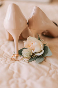 Close-up of white rose on table