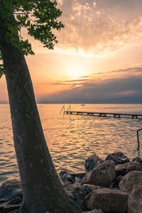 Scenic view of sea against sky during sunset