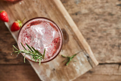 Close-up of drinks on wooden table