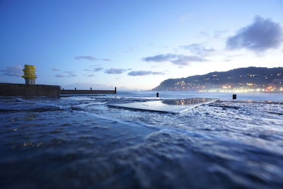 Scenic view of sea against blue sky