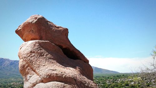 Tilt image of mountain against clear sky