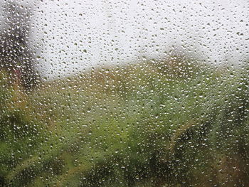 Full frame shot of wet glass window