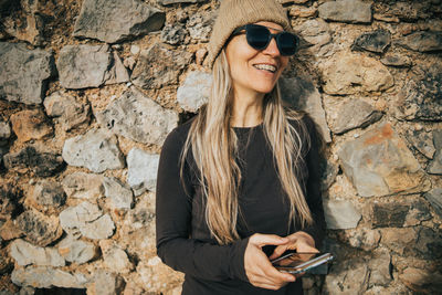 Girl smiling with mobile phone