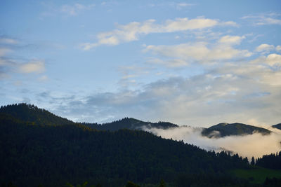 Scenic view of mountains against sky during sunset