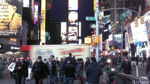 People walking on city street