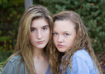 Close-up portrait of siblings