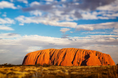 Defocused uluru, red rock - australia