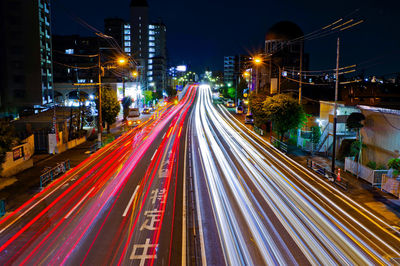 Light trails on city street at night