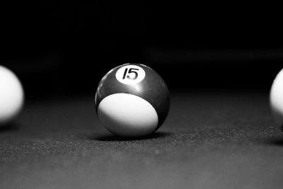 Close-up of pool balls on table