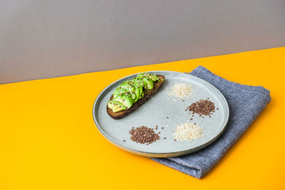 Ingredients for healthy avocado toast. sesame flax seeds. vegan keto diet. healthy eating. vegan 