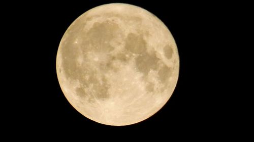 Scenic view of moon against sky at night