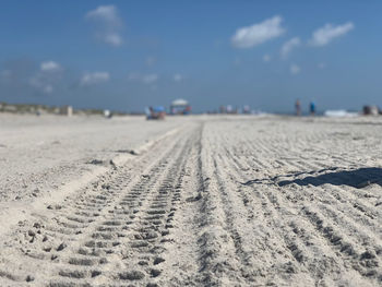 Surface level of tire tracks on beach