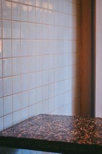 Close-up of tiled wall at home