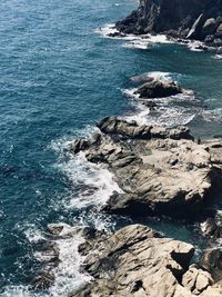 High angle view of rocks on shore