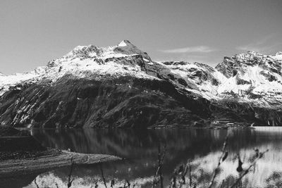 Scenic view of snowcapped mountains against sky