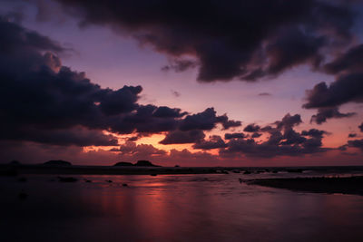 Scenic view of sea against sky at sunset