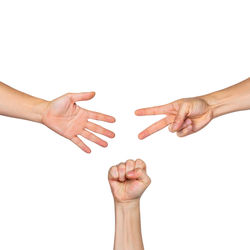 Low angle view of woman hand against white background