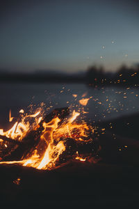 Close-up of bonfire at dusk