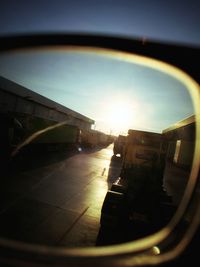 View of cars against sky during sunset