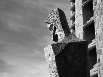 Low angle view of statue against sky