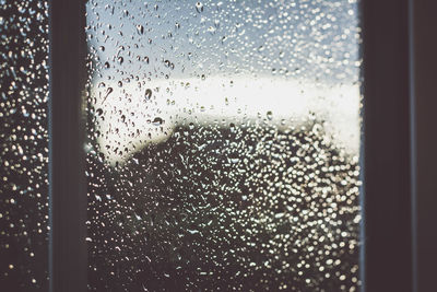 Full frame shot of water drops on glass