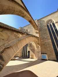 Low angle view of flying buttress majorca cathedral.