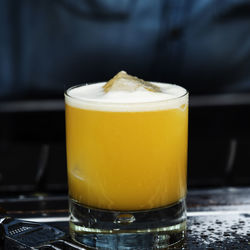 Close-up of beer in glass on table