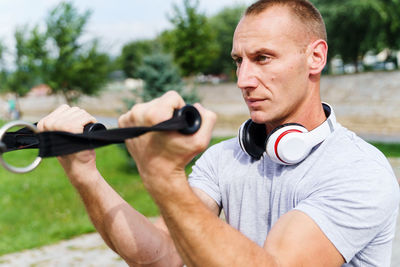 Mid adult man exercising outdoors