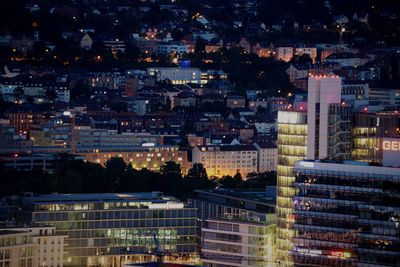 High angle view of buildings at night