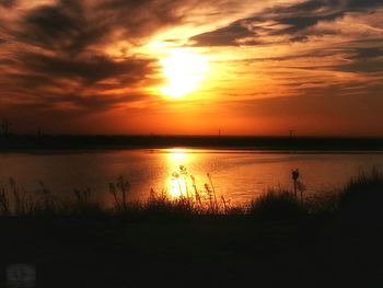 Scenic view of sunset over sea