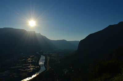 Scenic view of mountains against sky during sunset