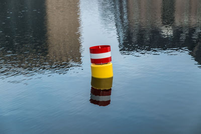 Yellow flag on lake