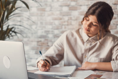 Businesswoman working at office