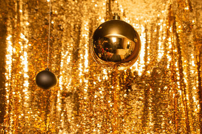 Illuminated lighting equipment hanging on christmas lights