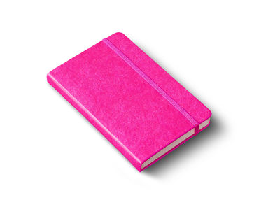 Close-up of pink book against white background