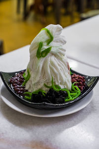 Close-up of served food in plate