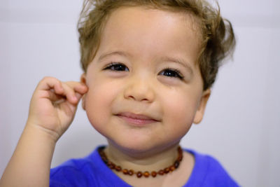 Close-up portrait of smiling boy