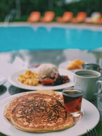 Close-up of drink served on table
