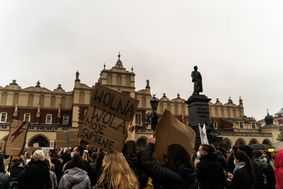 Group of people in front of building