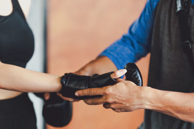 Close-up of man holding hands